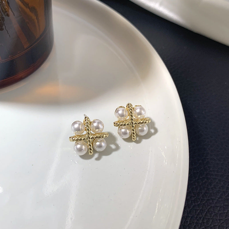 Four Natural Freshwater Pearl Earrings