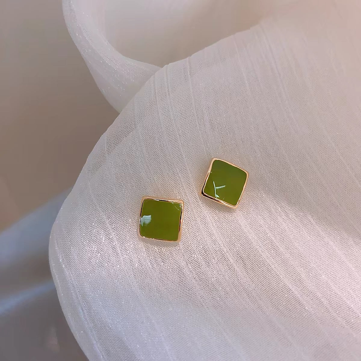Avocado green stud earrings