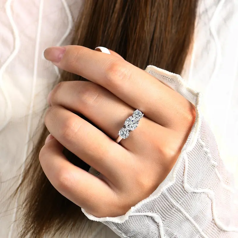 Three-stone moissanite ring