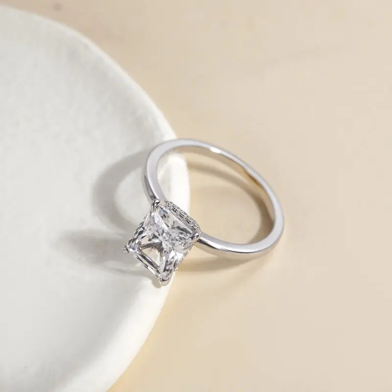 Radiant-cut solitaire diamond engagement ring